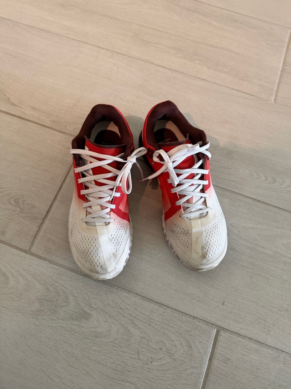 ON CLOUDS Women's White and Red Athletic Sneakers